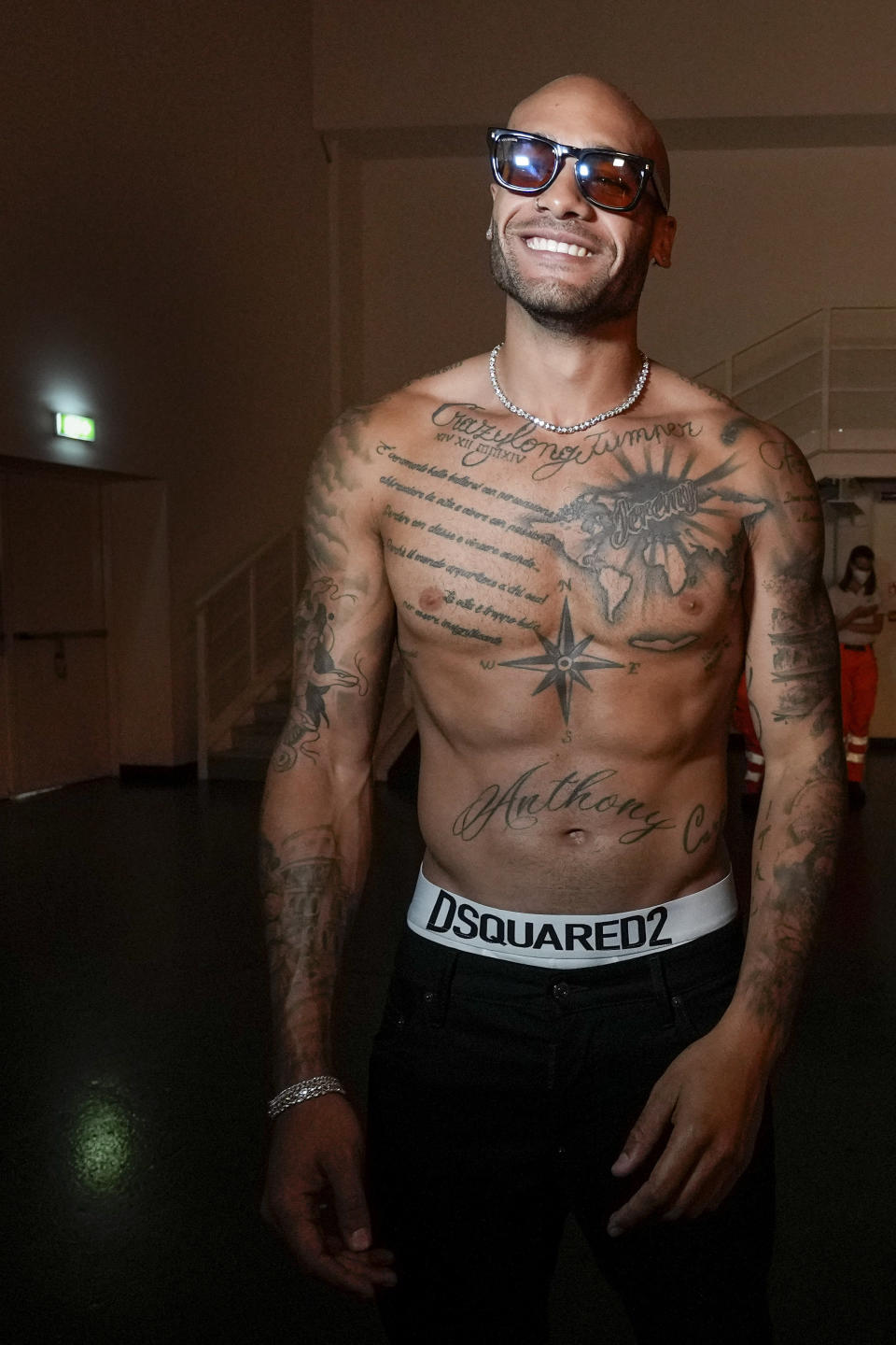 Marcell Jacobs backstage after the Dsquared2 men's Spring Summer 2023 collection presented in Milan, Italy, Friday, June 17, 2022. (AP Photo/Luca Bruno)