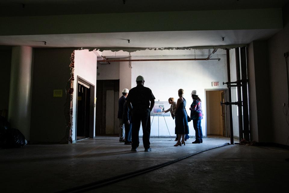 Cate Rudowsky, dean of University Libraries at Texas A&M University-Corpus Christi, explains plans to renovate its downtown building to house the library archives and special collections during a tour on April 12, 2023, in Corpus Christi, Texas.