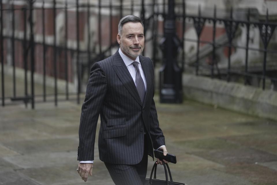 David Furnish, Elton John's husband, arrives the Royal Courts Of Justice in London, Wednesday, March 29, 2023. Elton John, Britain's Prince Harry and other celebrities are in a London court for a phone hacking lawsuit against the publisher of The Daily Mail. (AP Photo/Kin Cheung)