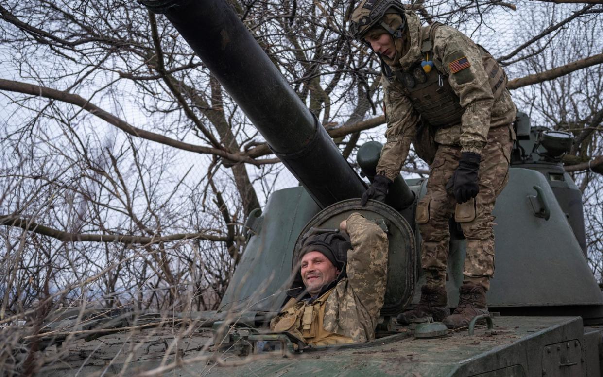 Ukrainian servicemen of the 28th Independent Mechanised Brigade prepare to fire 2S3 Akatsiya self-propelled howitzer, near the frontline town of Bakhmut, as Russia's attack on Ukraine continues, Donetsk region, Ukraine February 25, 2023. REUTERS/Marko Djuricaâ€¨ - REUTERS/Marko Djuricaâ€¨