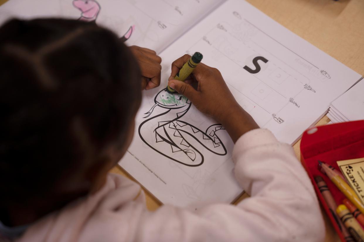 Kindergarten students learn phonemic awareness and foundational reading skills at Clifton School 17.