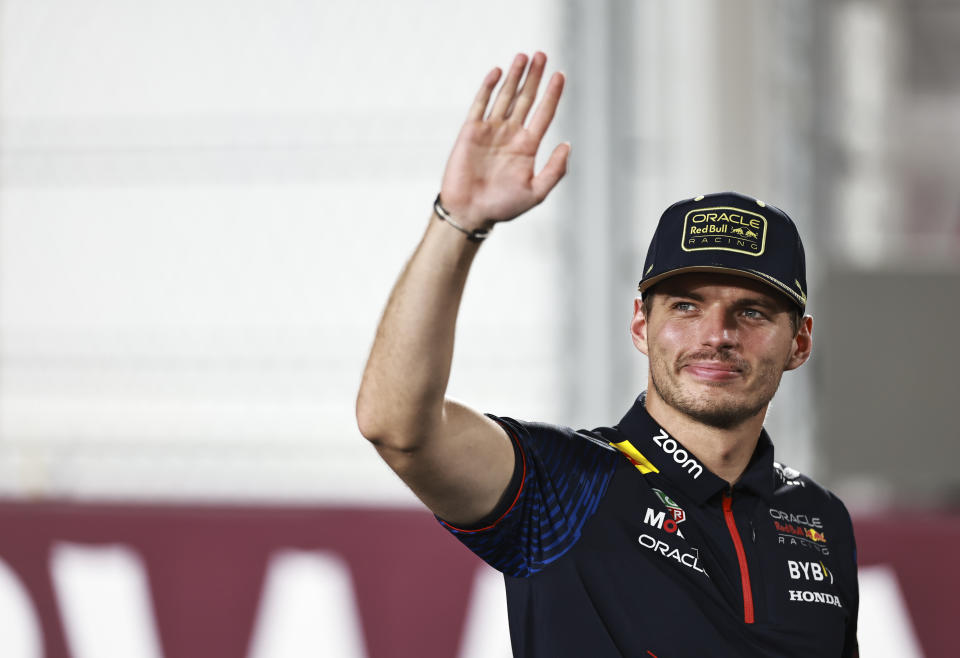 LUSAIL CITY, QATAR - OCTOBER 8: Max Verstappen of the Netherlands and Oracle Red Bull Racing waves to the crowd before the F1 Grand Prix of Qatar at Lusail International Circuit on October 8, 2023 in Lusail City, Qatar. (Photo by Qian Jun/MB Media/Getty Images)