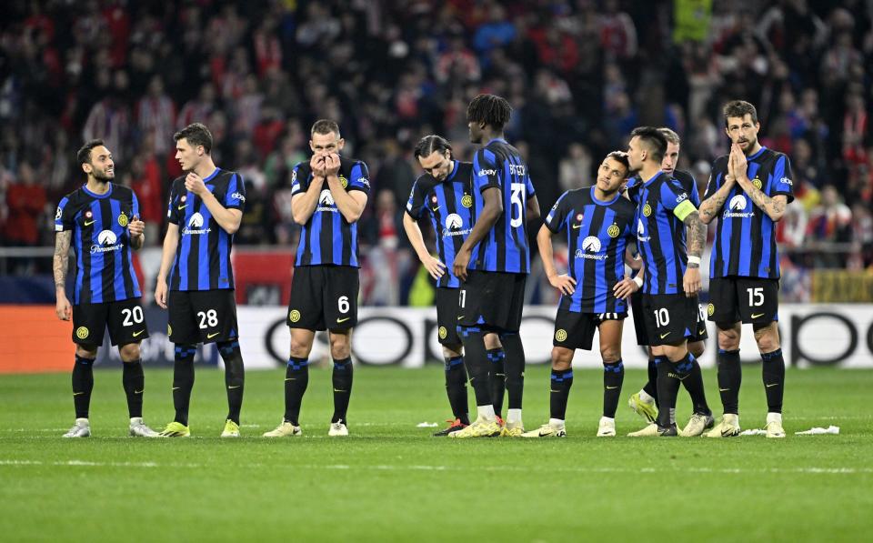 Players of Inter react during the UEFA Champions League Round of 16 second leg