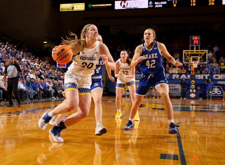 BROOKINGS, SD - MARCH 24: Tori Nelson #20 of the South Dakota State Jackrabbits drives to the basket against the Drake Bulldogs during their Sweet 16 game of the WNIT Tournament at Frost Arena on March 24, 2022 in Brookings, South Dakota. (Photo by Dave Eggen/Inertia)