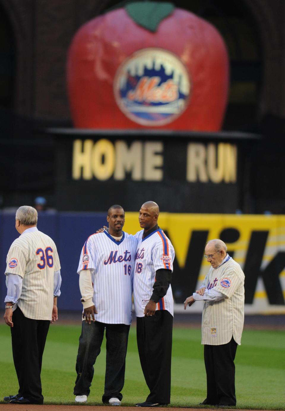 Former Mets greats Doc Gooden and Daryl Strawberry hug during a tribute to Shea Stadium after the final game on Sept. 28, 2008.