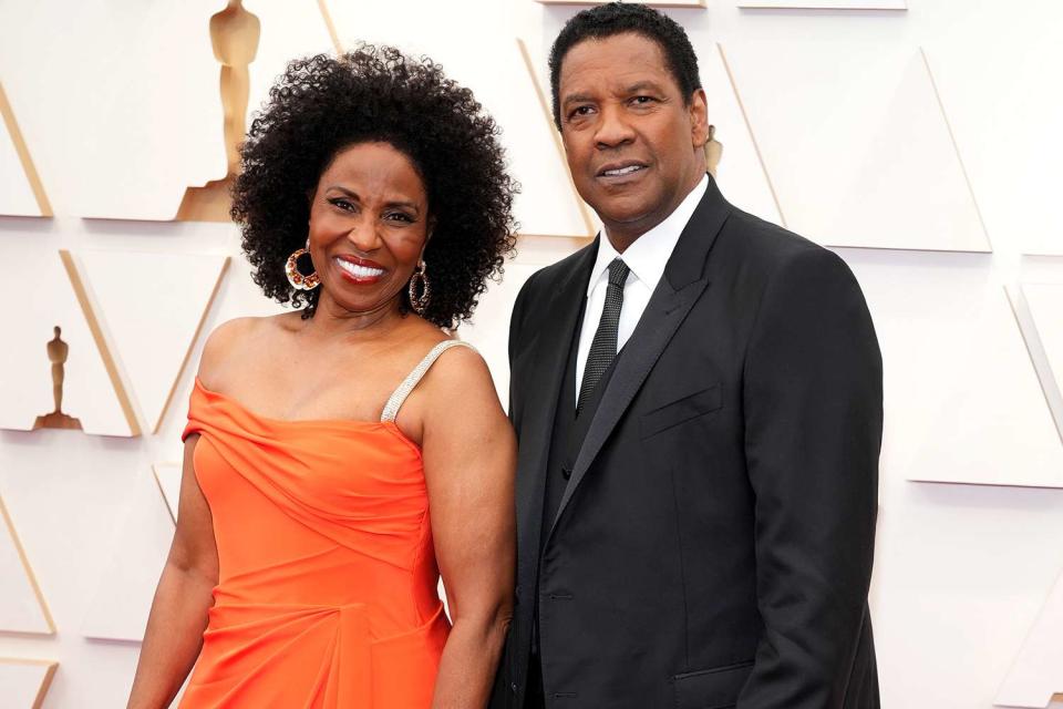 <p>Kevin Mazur/WireImage</p> Pauletta Washington and Denzel Washington on March 27, 2022