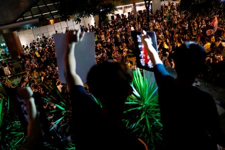 Anti-extradition bill protesters attend a rally calling on the British and U.S. governments to monitor the implementation of "one country two systems" principal, in Hong Kong