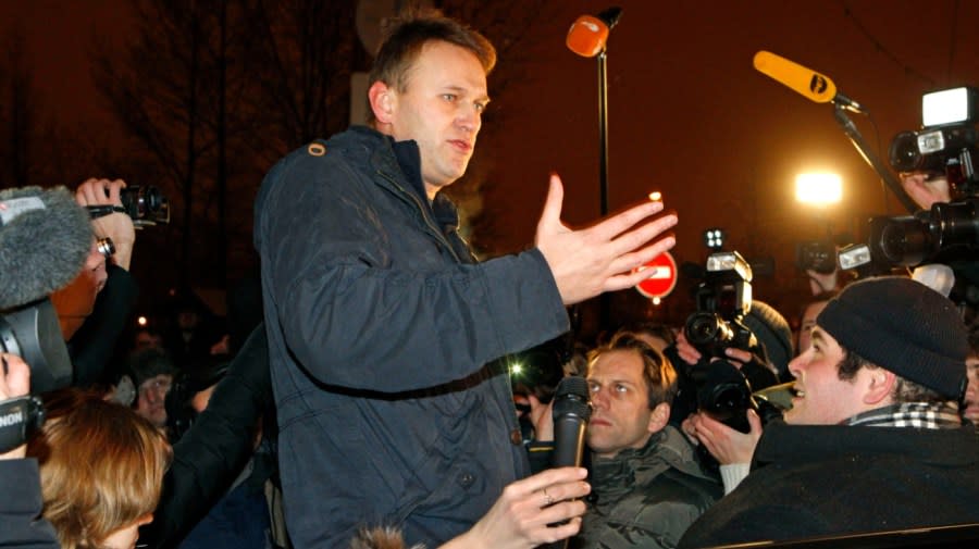 <em>FILE – Navalny speaks to journalists after being released from a police custody on the outskirts of Moscow early Wednesday, Dec. 21, 2011. </em>(AP Photo/Mikhail Metzel, File)