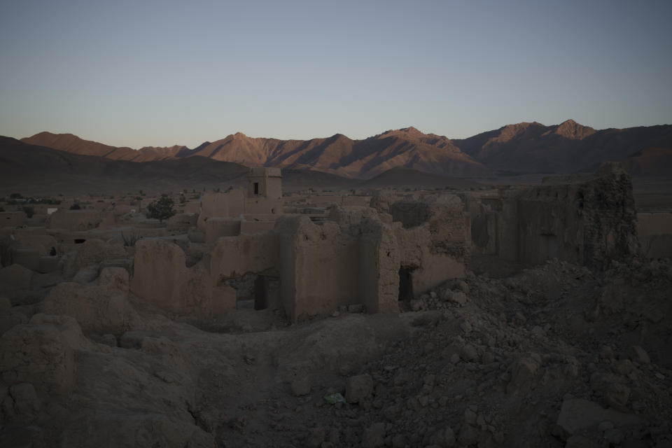 Ruins of homes destroyed during war are seen in Salar village, Wardak province, Afghanistan, Tuesday, Oct. 12, 2021. In urban centers, public discontent toward the Taliban is focused on threats to personal freedoms, including the rights of women. In Salar, these barely resonate. The ideological gap between the Taliban leadership and the rural conservative community is not wide. Many villagers supported the insurgency and celebrated the Aug. 15 fall of Kabul which consolidated Taliban control across the country. (AP Photo/Felipe Dana)