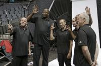 <p>The coaching staff learns how to wave to people. (AP) </p>