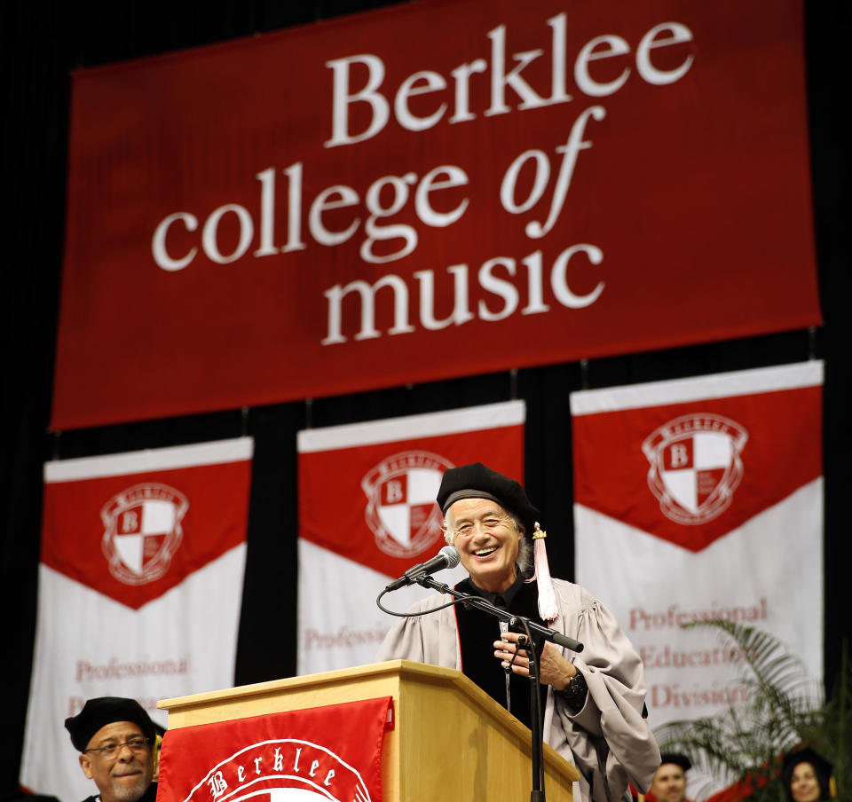Former Led Zeppelin guitarist Jimmy Page smiles as he speaks during the commencement of the Berklee College of Music in Boston, Saturday, May 10. 2014. (AP Photo/Winslow Townson)