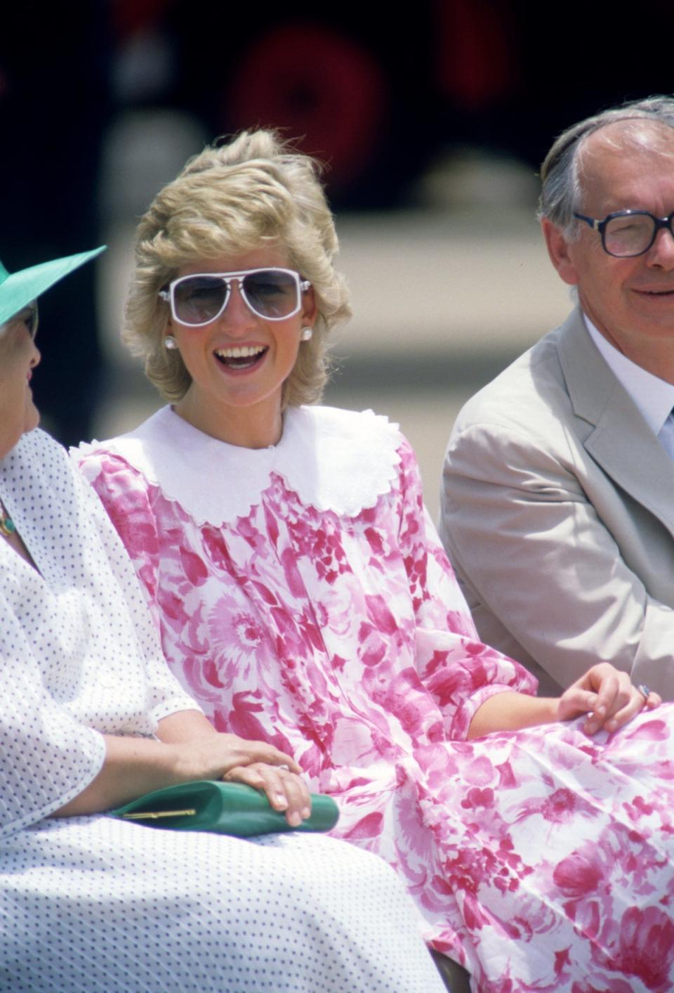 Diana watching Charles inspect the guard at Darwin Airport on a tour of Australia in 1988 (Ron Bell/PA) (PA Archive)