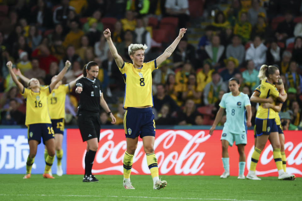 Sweden's Lina Hurtig celebrates with teammates after defeating Australian in the Women's World Cup third place playoff soccer match in Brisbane, Australia, Saturday, Aug. 19, 2023. (AP Photo/Tertius Pickard)
