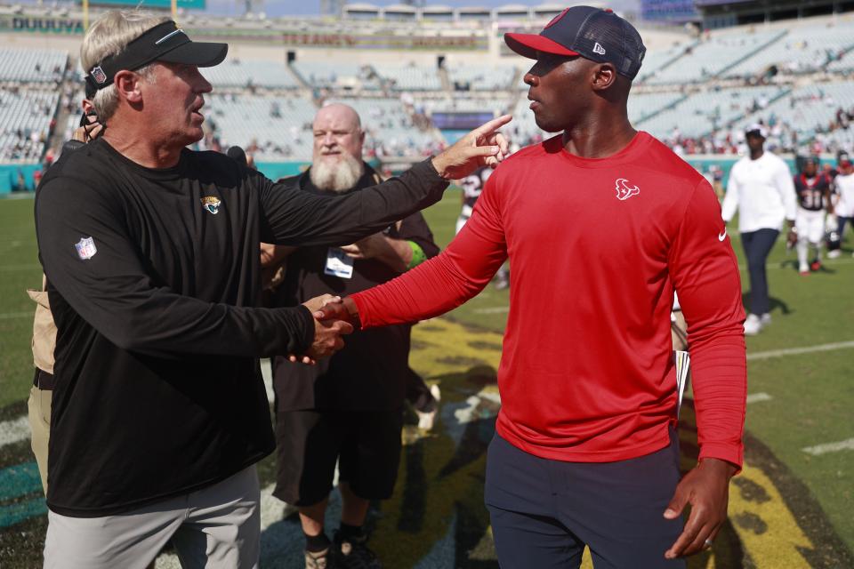 Jacksonville Jaguars head coach Doug Pederson and Houston Texans DeMeco Ryans shake hands midfield after the game of an NFL football matchup Sunday, Sept. 24, 2023 at EverBank Stadium in Jacksonville, Fla. The Houston Texans defeated the Jacksonville Jaguars 37-17. [Corey Perrine/Florida Times-Union]