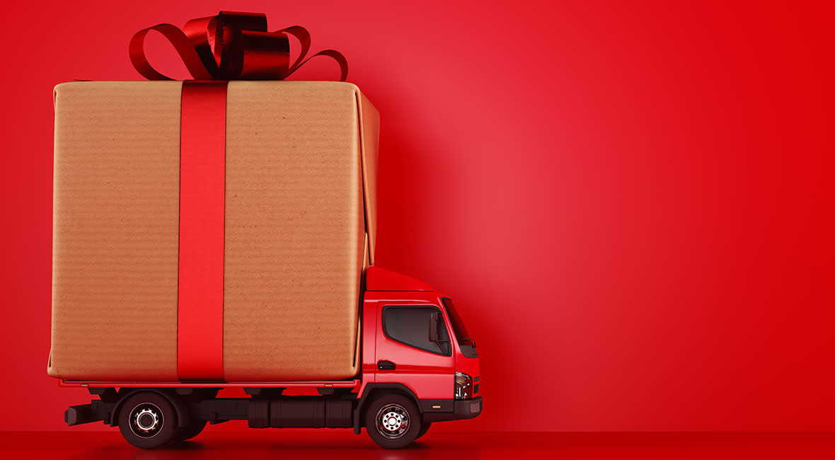 red truck hauling a gift 