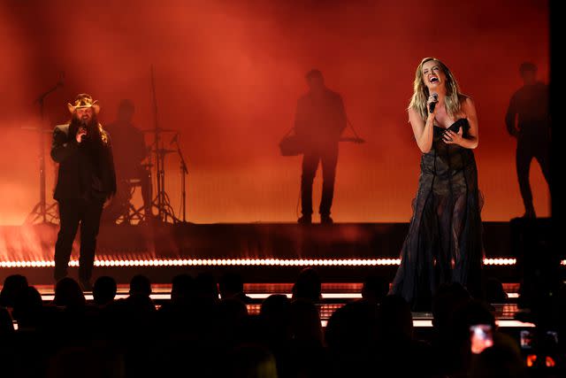 <p>Terry Wyatt/Getty </p> Chris Stapleton and Carly Pearce perform at the CMA Awards on Nov. 8, 2023 in Nashville