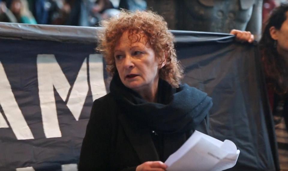 Nan Goldin speaks at a rally