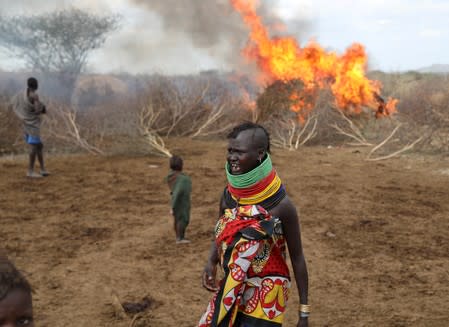 The Wider Image: When raiders menace in northern Kenya, grab your guns