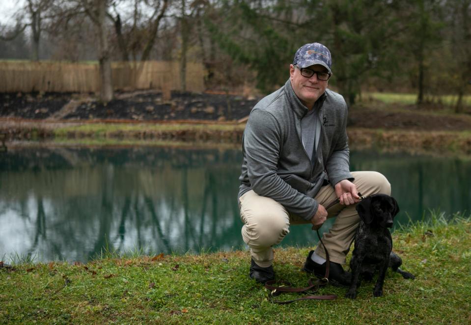 Mike Posey, owner of M2 Bed Bugs, is with his dog, Turbo, in Lancaster.