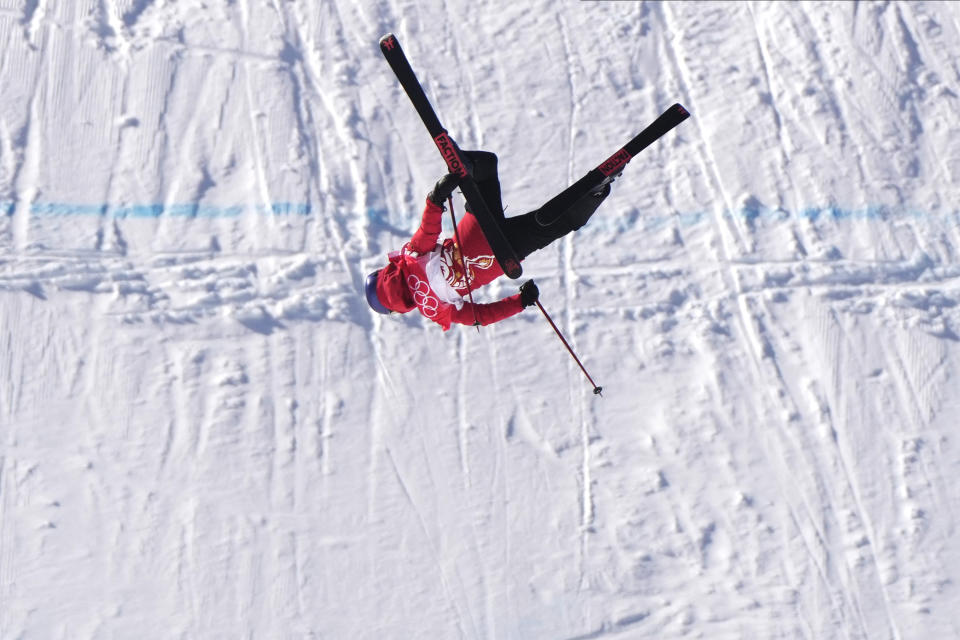 China's Eileen Gu competes during the women's slopestyle qualification at the 2022 Winter Olympics, Monday, Feb. 14, 2022, in Zhangjiakou, China. (AP Photo/Francisco Seco)