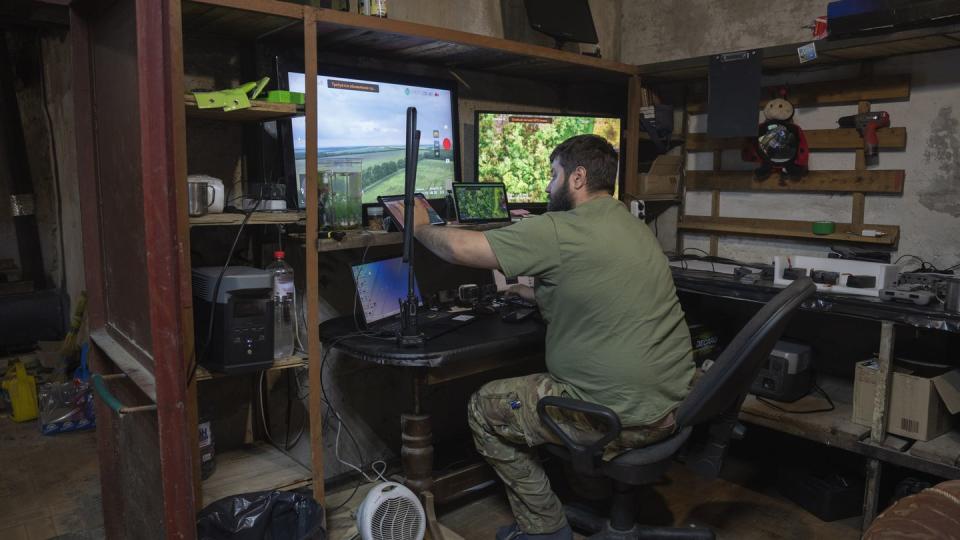 A Ukrainian officer works in his battalion headquarters on the frontline near Bakhmut, Donetsk region, Ukraine, Monday, May 29, 2023. (Efrem Lukatsky/AP)