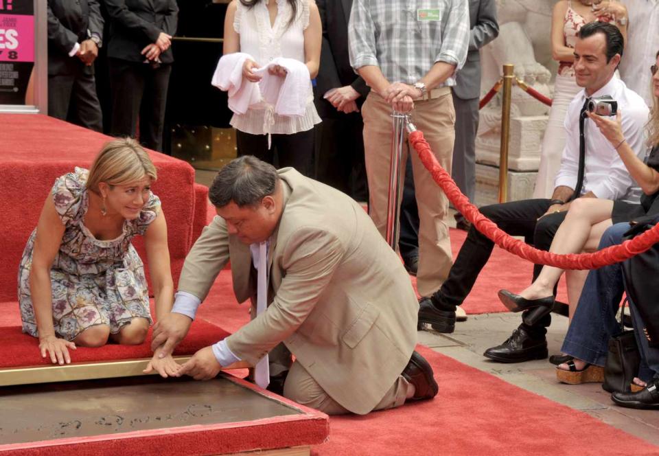 Justin Theroux looks on at Jennifer Aniston's Hand & Footprint Ceremony at the Grauman's Chinese Theatre on July 7, 2011 in Hollywood, California