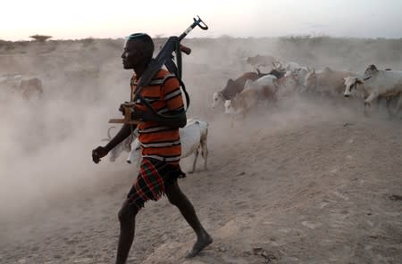 The Wider Image: When raiders menace in northern Kenya, grab your guns