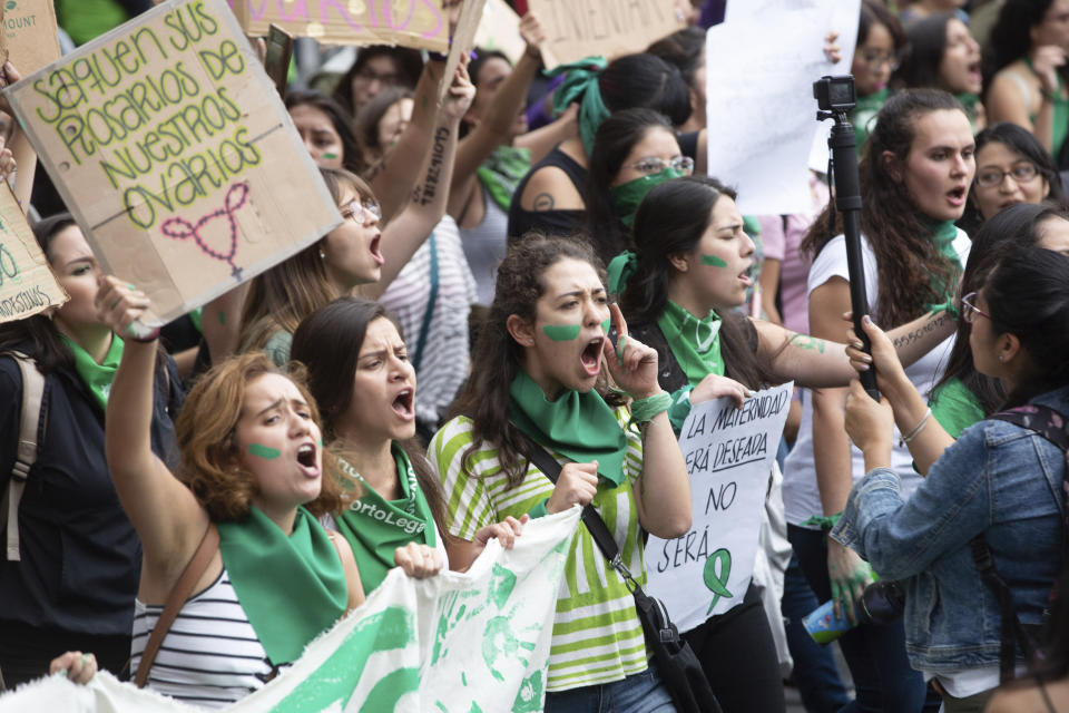 Women march for abortion rights in Mexico City, Saturday Sept. 28, 2019. Mexican women on Saturday marched on Saturday highlighting increased efforts across Latin America to lift some of the world's most restrictive abortion laws. (AP Photo/Anthony Vazquez)