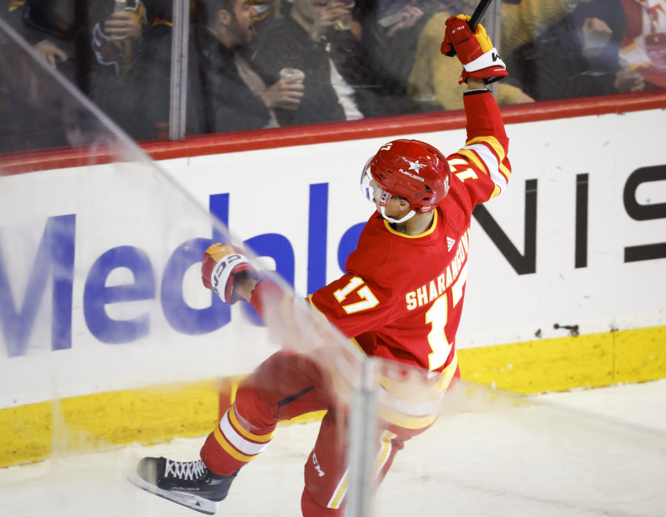 Calgary Flames forward Yegor Sharangovich (17) celebrates goal during the third period of an NHL hockey game against the Los Angeles Kings, Tuesday, Feb. 27, 2024 in Calgary, Alberta. (Jeff McIntosh/The Canadian Press via AP)