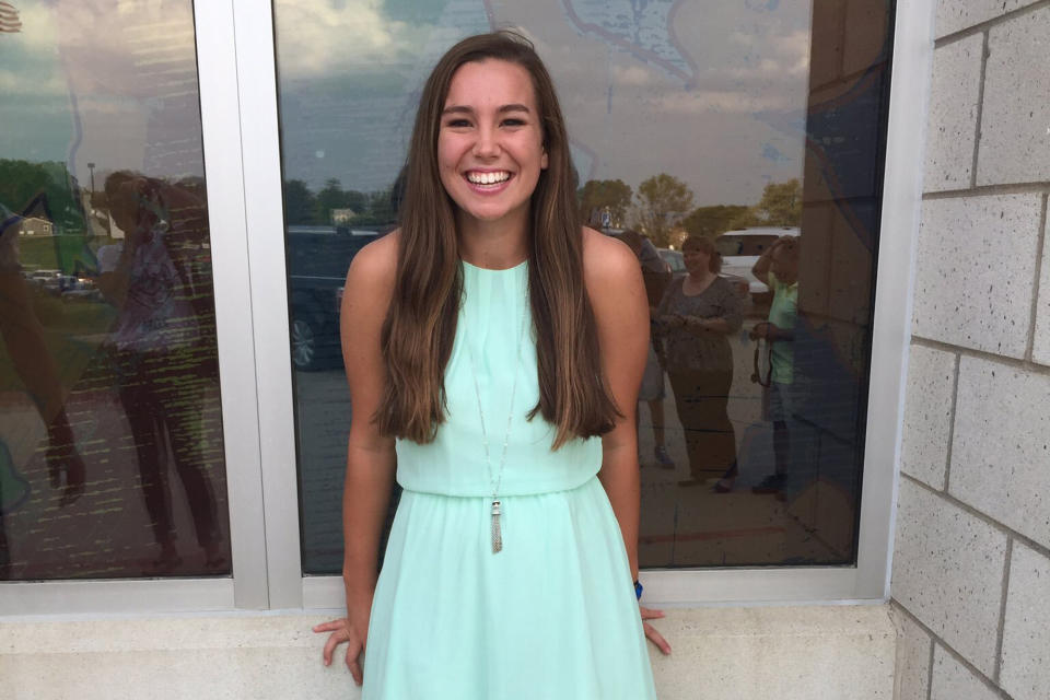 FILE - In this September 2016 file photo provided by Kim Calderwood, Mollie Tibbetts poses for a picture during homecoming festivities at BGM High School in her hometown of Brooklyn, Iowa. Video evidence, DNA analysis and a partial confession will be critical to proving Cristhian Bahena Rivera, a farm laborer, stabbed Tibbetts, a University of Iowa student, to death while she was out for a run in 2018, a prosecutor told jurors Wednesday, May 19, 2021. (Kim Calderwood via AP, File)