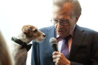 Take a bow-wow-wow: Uggie, the dog from the film "The Artist", is interviewed by Larry King in New York.