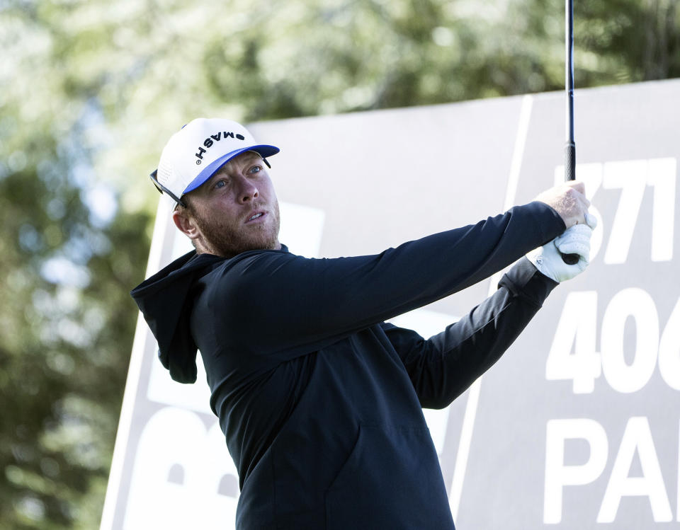 Talor Gooch, of Smash GC, hits from the third tee during the final round of LIV Golf Las Vegas at Las Vegas Country Club, Saturday, Feb. 10, 2024, in Las Vegas. (Mike Stobe/LIV Golf via AP)