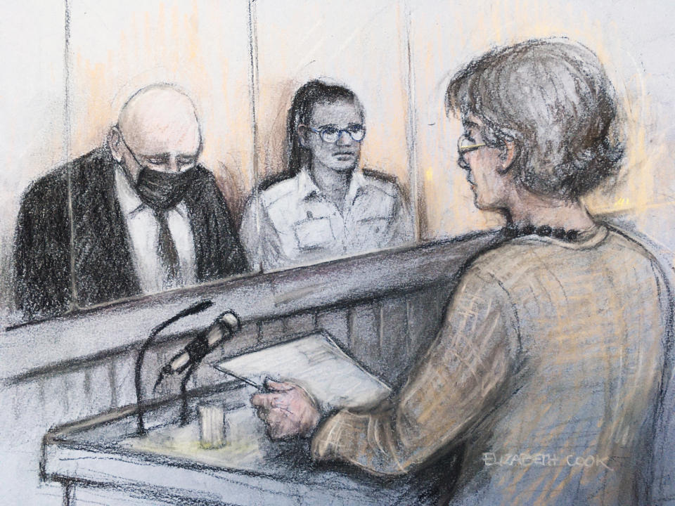 Court artist sketch by Elizabeth Cook of Susan Everard (right), the mother of Sarah Everard, reading a victim impact statement as former Metropolitan Police officer Wayne Couzens (left), 48, sits in the dock with his head bowed. (PA)