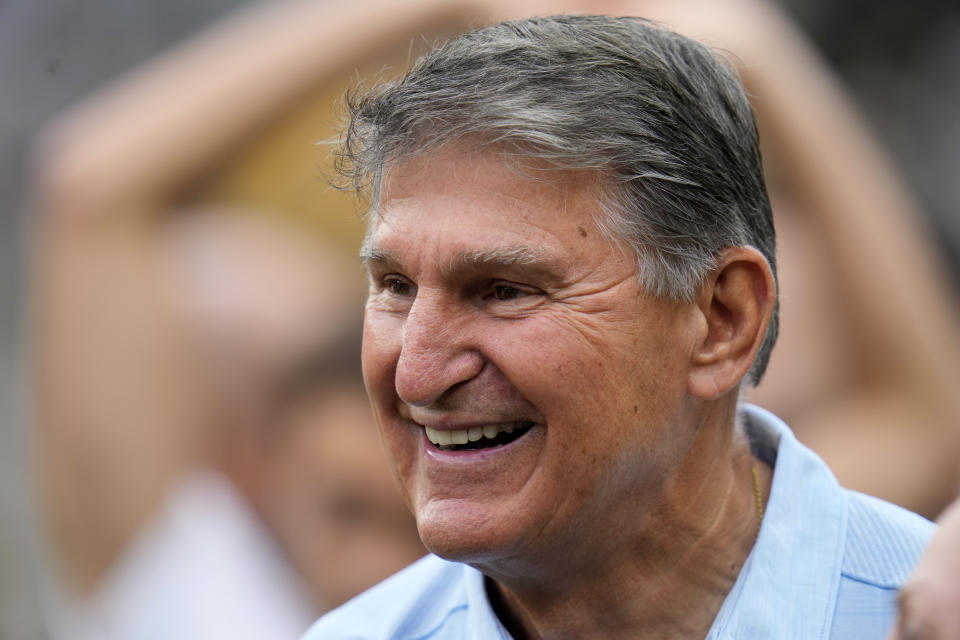 FILE - Sen. Joe Manchin, D-W.Va., visits the sidelines at Acrisure Stadium during warm ups before an NFL football game between the Pittsburgh Steelers and the San Francisco 49ers in Pittsburgh, Sept. 10, 2023. Manchin announced he won't seek reelection in 2024, giving Republicans a prime opportunity to gain a seat in the heavily GOP state. (AP Photo/Gene J. Puskar, File)