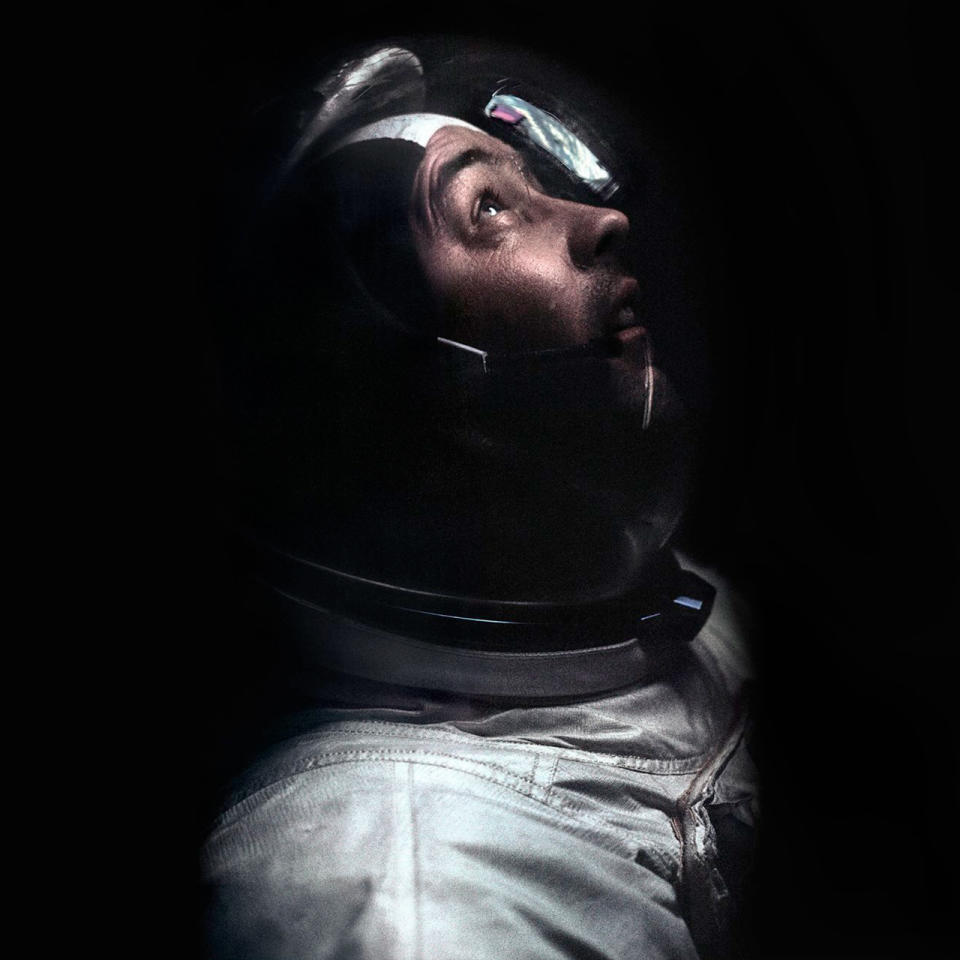 Apollo 9 commander Jim McDivitt looks out the window as he flies the lunar module 