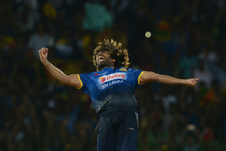 Sri Lankan cricketer Lasith Malinga celebrates taking the hat trick wicket to dismiss Bangladesh cricketer Mehedi Hasan during the second T20 international cricket match between Sri Lanka and Bangladesh in Colombo on April 6, 2017