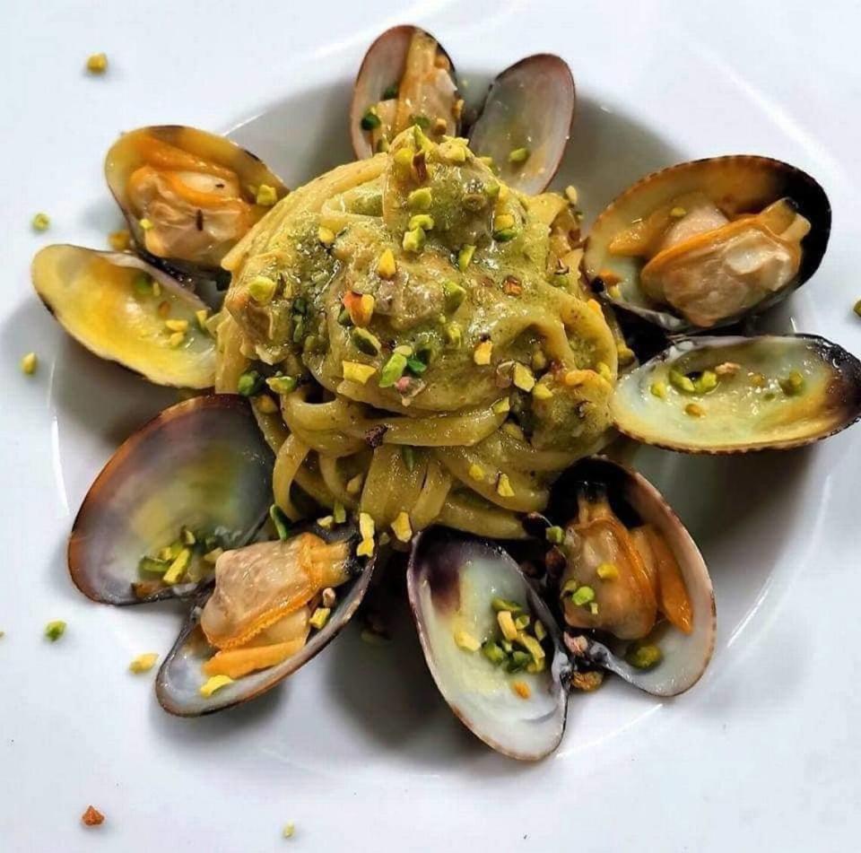 Clams scampi with pistachios is one of many offerings at Cafe di Lorenzo, 608 14th St. W, Bradenton.