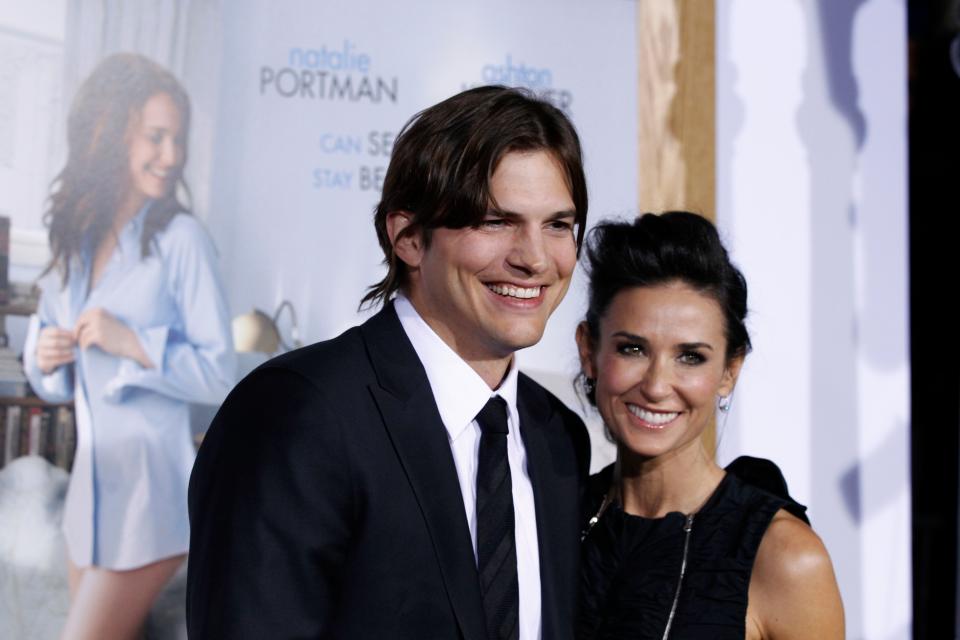 Ashton Kutcher, left, opened up about his fertility struggles with ex-wife Demi Moore, including a miscarriage Moore suffered, during an Esquire interview.