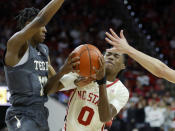 North Carolina State's Terquavion Smith (0) drives against Georgia Tech's Miles Kelly, left, and Lance Terry during the second half of an NCAA college basketball game Saturday, Feb. 4, 2023, in Raleigh, N.C. (Kaitlin McKeown/The News & Observer via AP)