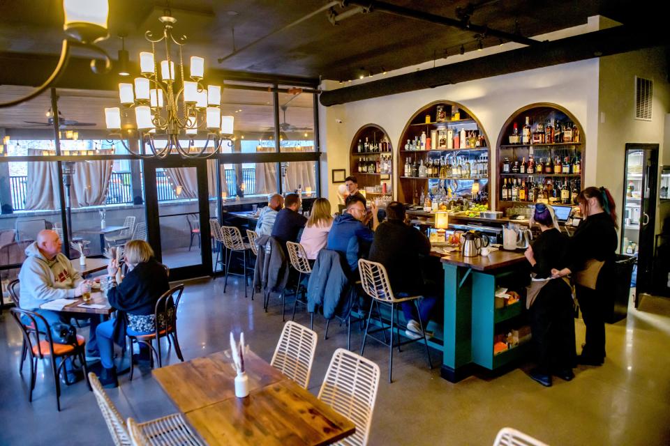 A small crowd fills the bar at the new Latin-themed restaurant Verandah Cocina Latina in Morton.