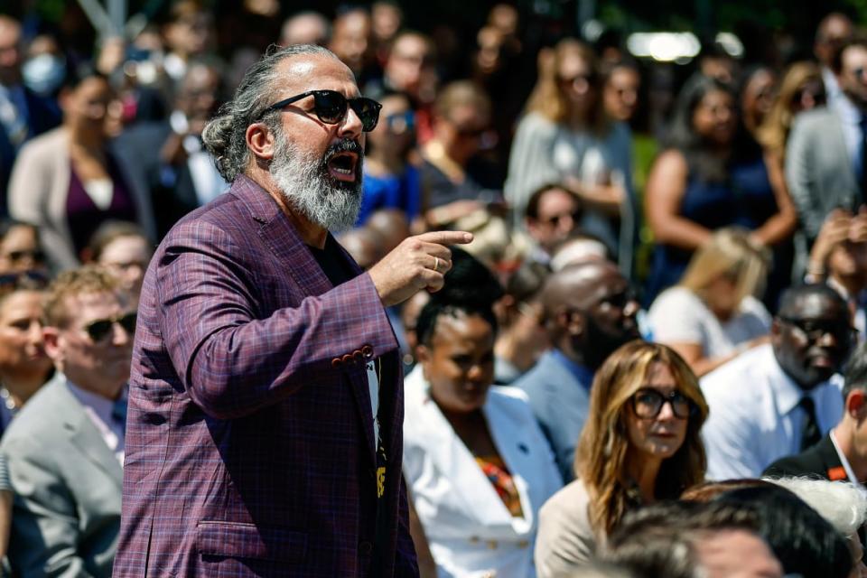 <div class="inline-image__caption"><p>Manuel Oliver, whose son Joaquin was killed in the Parkland mass shooting, interrupts U.S. President Joe Biden as he delivers remarks at an event to celebrate the Bipartisan Safer Communities Act on the South Lawn of the White House on July 11, 2022 in Washington, DC.</p></div> <div class="inline-image__credit">Chip Somodevilla/Getty</div>