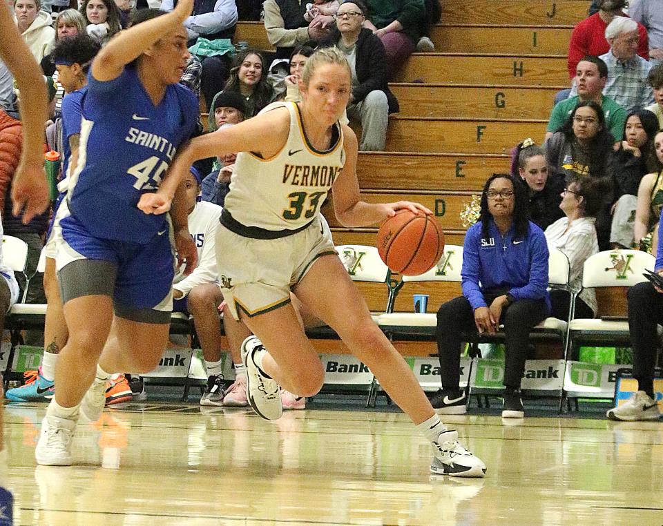 Vermont's Delaney Richason drives the baseline during the Catamounts' 57-54 loss to St. Louis in the WNIT Fab 4 at Patrick Gym on Wednesday, April 3, 2024.