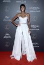 <p>The model showed off her new cropped hair in an ivory two-piece by Alberta Ferretti.<br><i>[Photo: Getty]</i> </p>