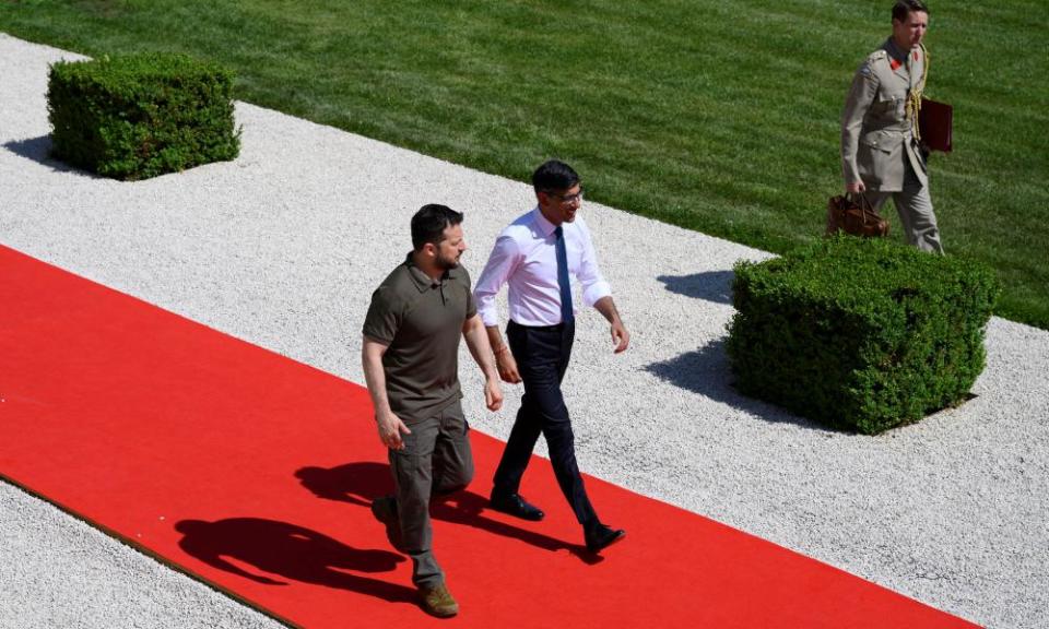 Volodymyr Zelenskiy and Rishi Sunak walk together during the European political community summit in Moldova on Thursday.