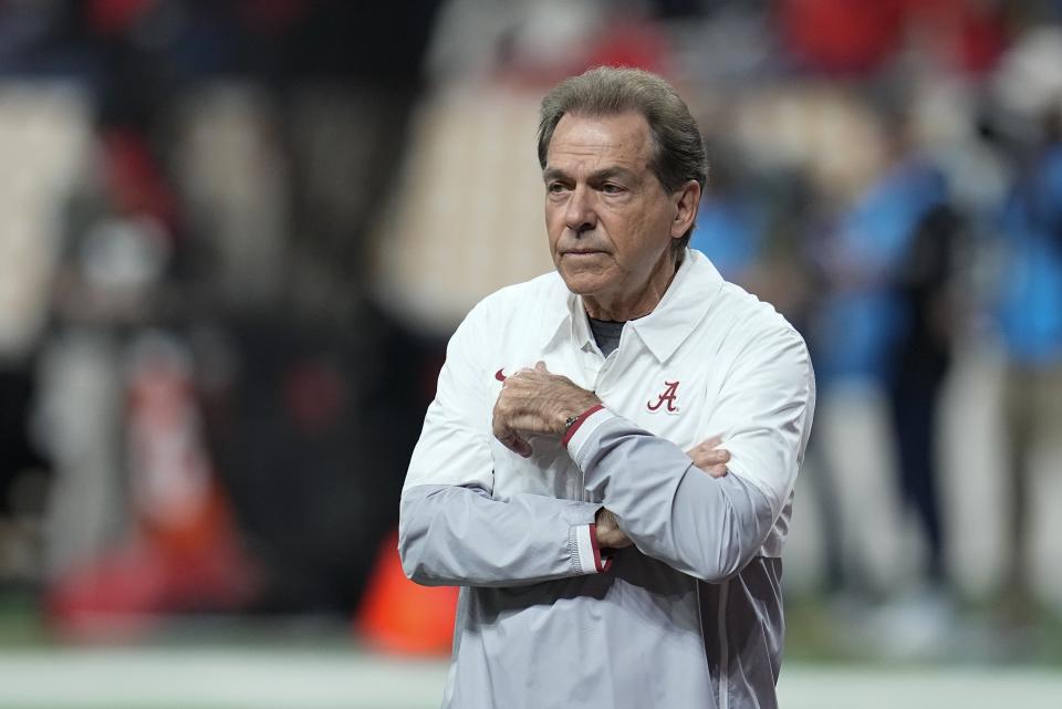 Alabama head coach Nick Saban watches warm ups before the College Football Playoff championship football game against Georgia Monday, Jan. 10, 2022, in Indianapolis. (AP Photo/Paul Sancya)