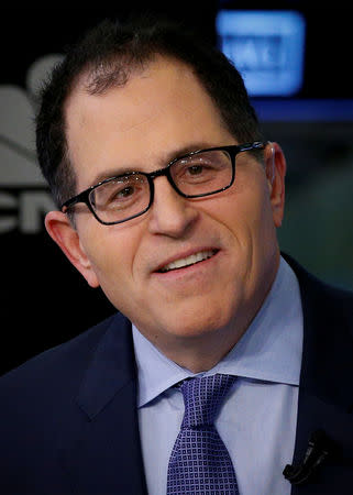 Dell CEO Michael Dell speaks during an interview with CNBC on the floor of the New York Stock Exchange (NYSE) in New York, U.S., July 2, 2018. REUTERS/Brendan McDermid/Files