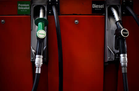 Fuel pumps are seen at a Texaco petrol station in London, Britain, July 26, 2017. REUTERS/Hannah McKay