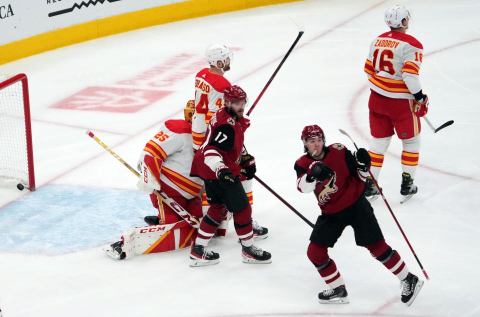 Feb 2, 2022; Glendale, Arizona, USA; Arizona Coyotes right wing Clayton Keller (9) celebrates his goal against the Calgary Flames during the second period at Gila River Arena.