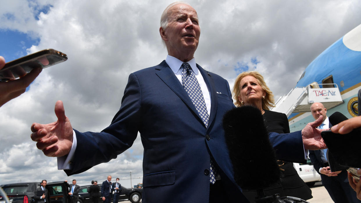 Jill Biden looks on as President Biden speaks to reporters before boarding Air Force One in Buffalo on Tuesday. 