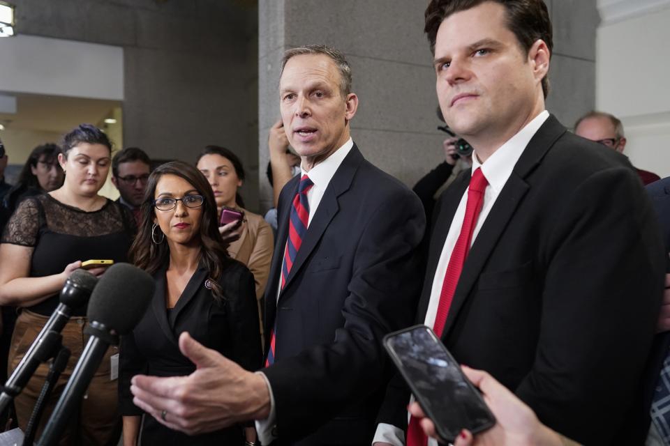 Rep. Scott Perry, R-Pa., speaks at the Capitol in Washington, Tuesday, Jan. 3, 2023, on the opening day of the 118th Congress, as Rep. Matt Gaetz, R-Fla., right, and Rep. Lauren Boebert, R-Colo., listen. All three are members of the Freedom Caucus and oppose Rep. Kevin McCarthy, R-Calif., as the new House Speaker.